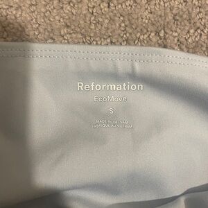 Reformation leggings, two pairs (blue and pink) both size S